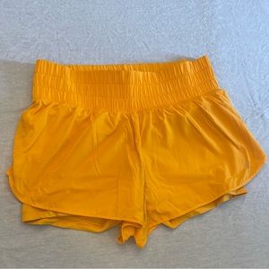 Orange Gilly Hick running shorts, size XL